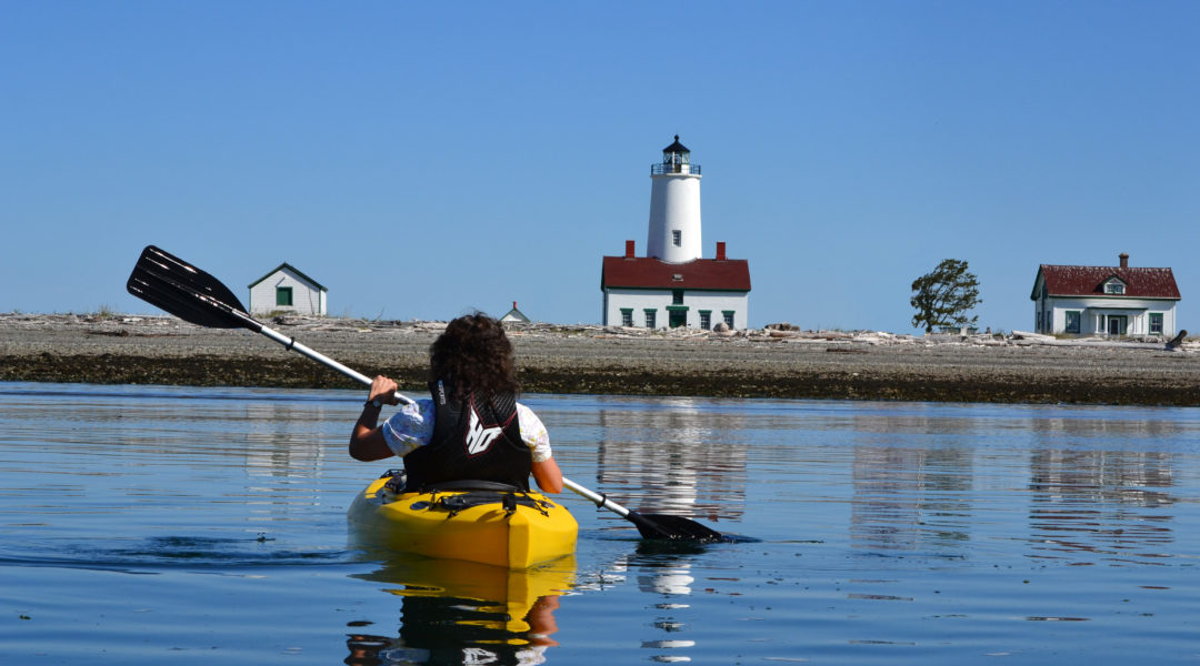 Kayaker and Dungeness Lighthouse